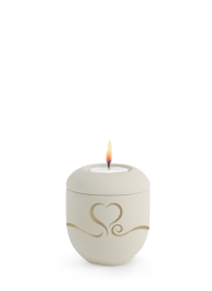 Ceramiczna mini urna Melina Creme, aksamitna, kremowa, złote serce, świeca z pokrywką.